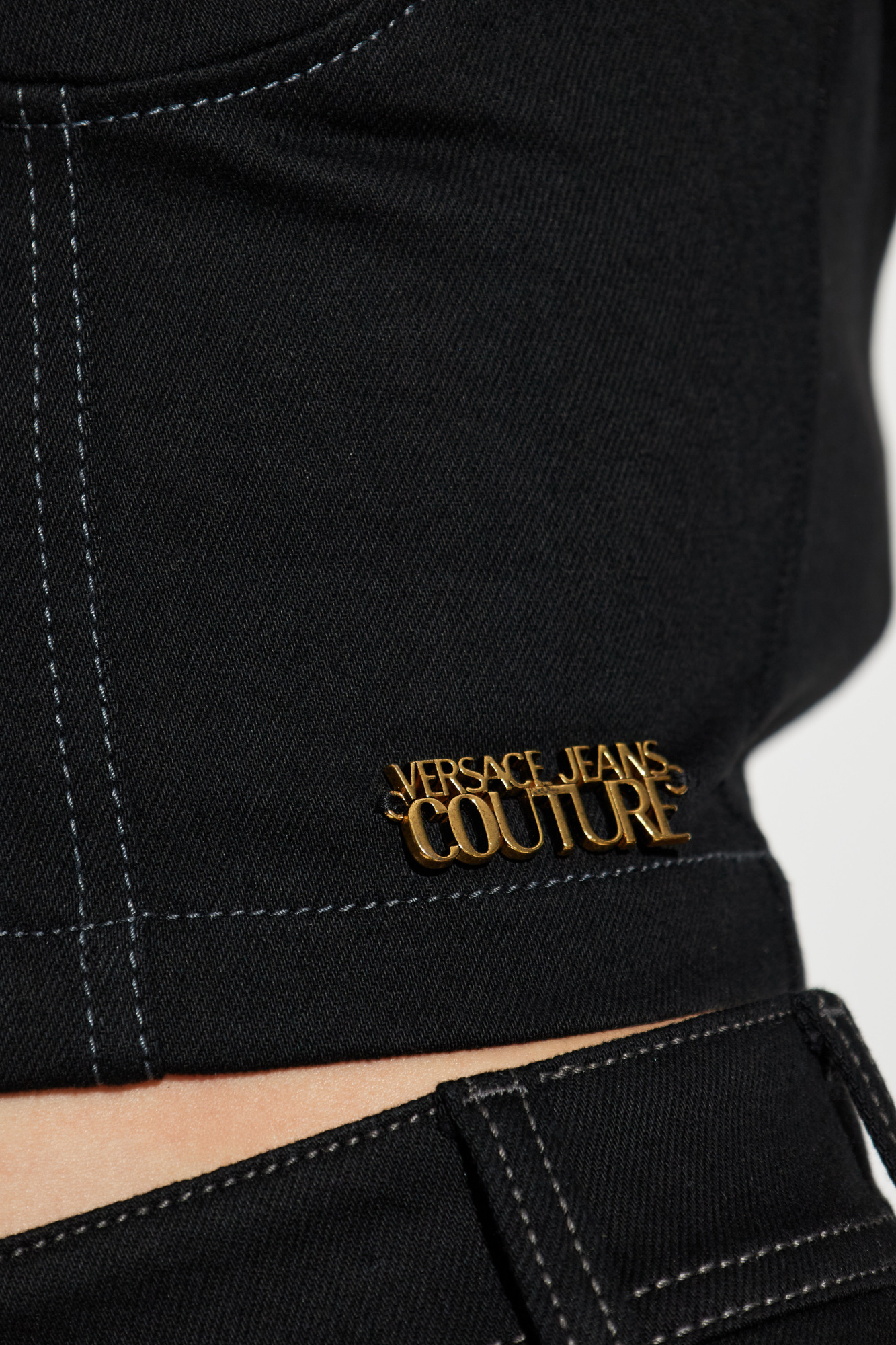 Black Top with an application in the shape of a logo Versace